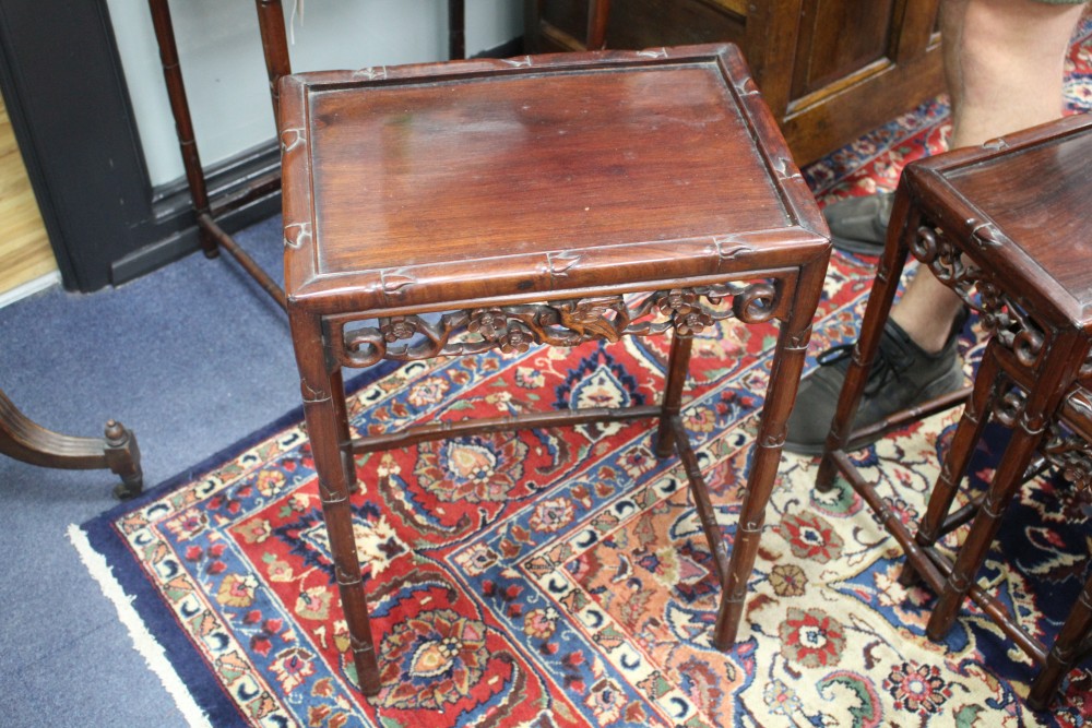 A nest of four 19th century Chinese carved pierced hardwood tables, W.50cm D.36cm H.71cm